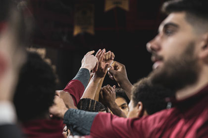 People lifting each other up in prayer